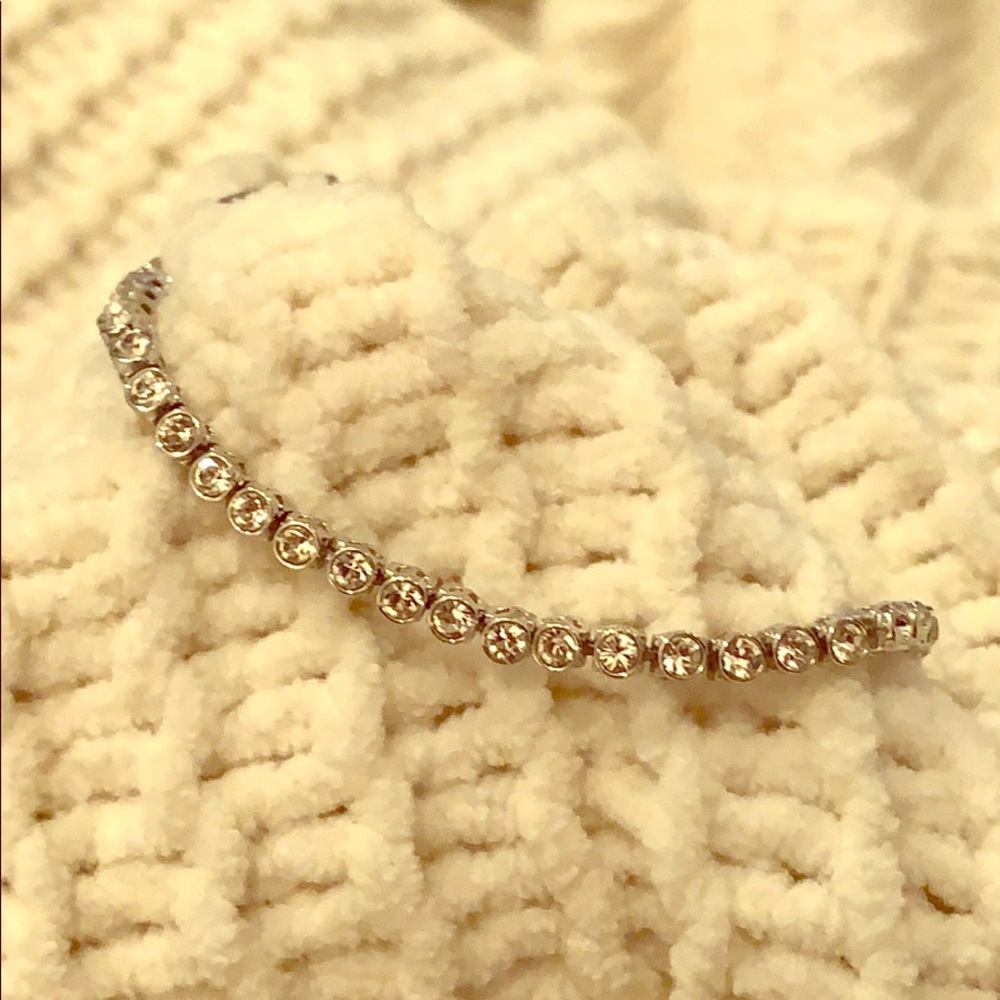 Swarovski tennis bracelet.